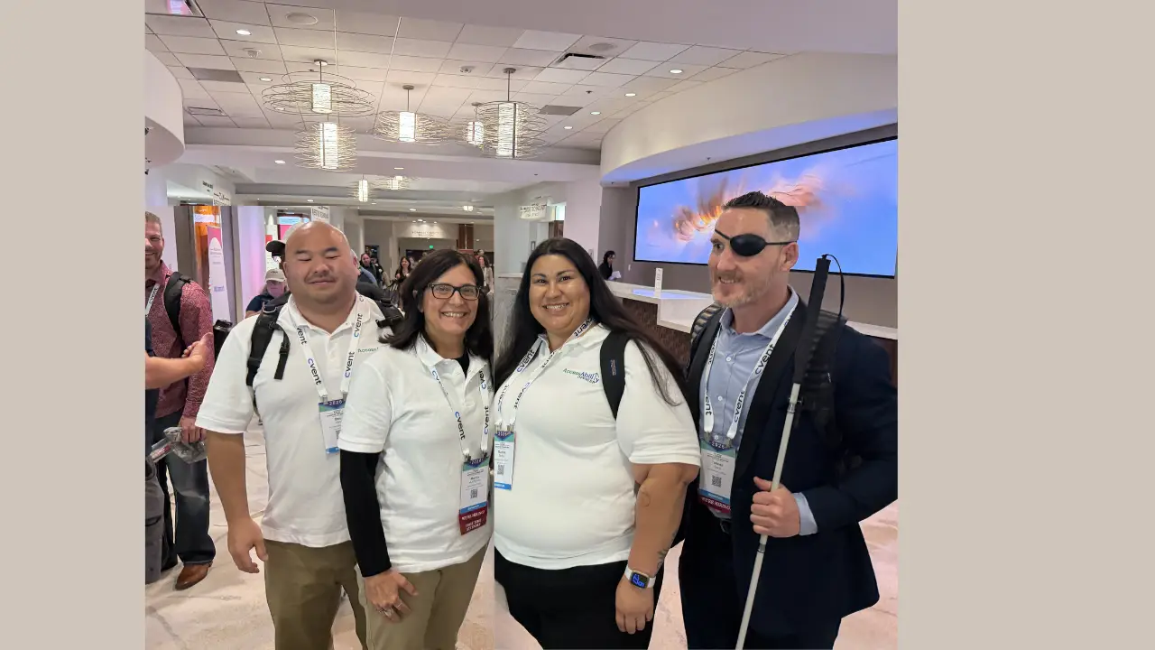 AccessAbility Officer team at the CSUN conference hall: Bee Yang, Digital accessibility tester, CAT Program instructor; Marcia Hutchinson, Project Manager; Marisa Reder, Business Operations Manager; Tanner Gers, CEO, Founder of AccessAbility Officer