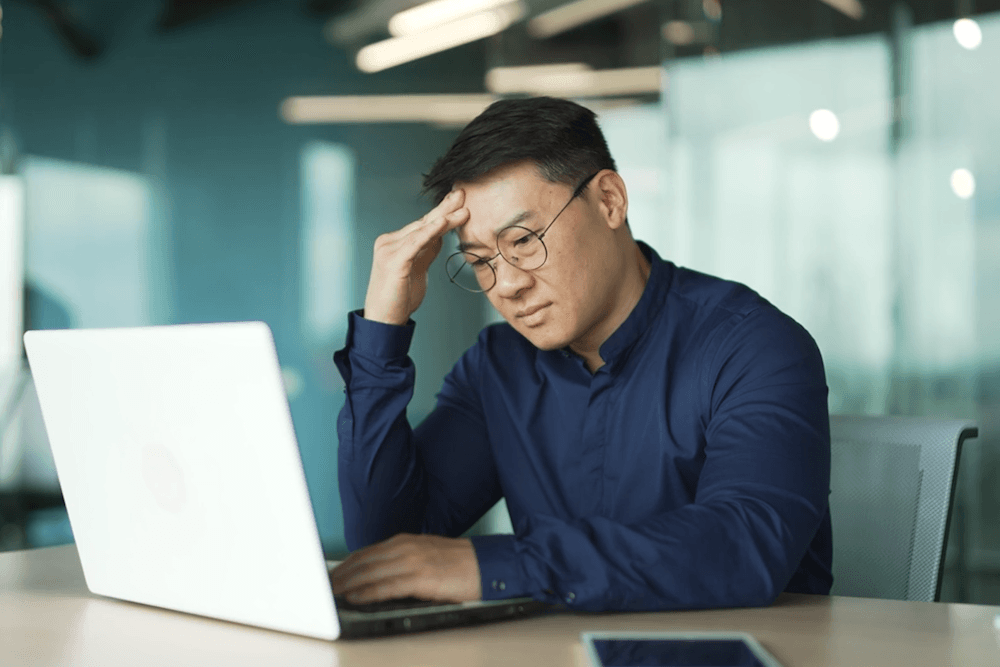 Frustrated Worker in Business Setting