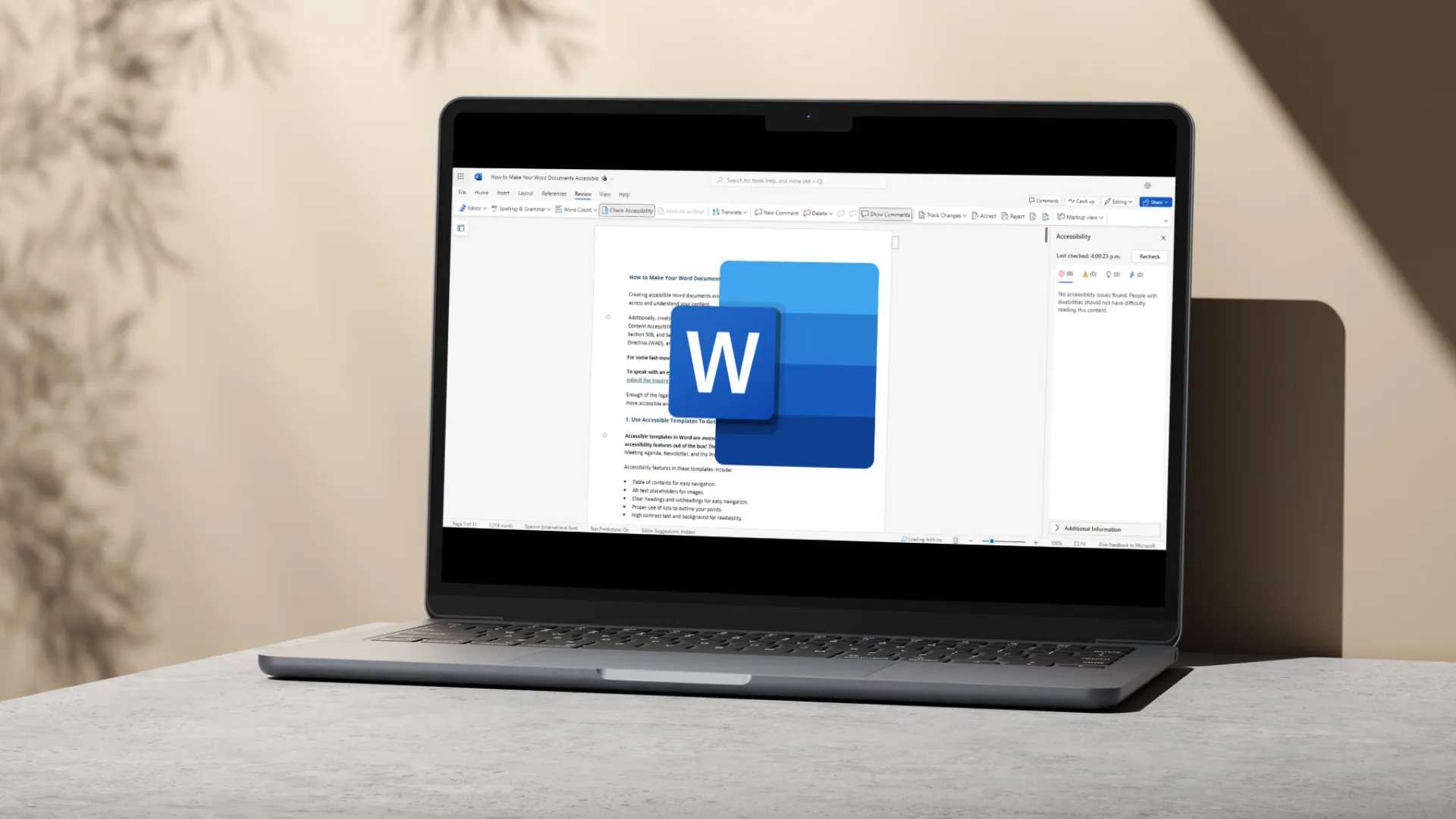 Laptop displaying Microsoft Word with accessibility tools and blue W icon